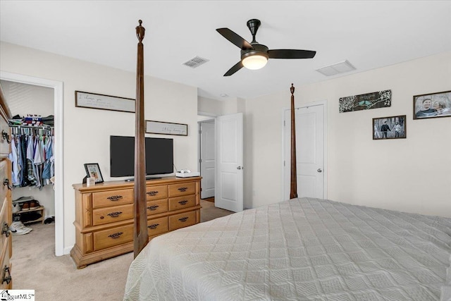 275 Ralston Rd, Greer, SC 29651 - bedroom with light colored carpet, a spacious closet, a closet, and a ceiling fan