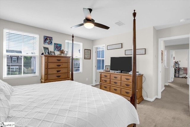 275 Ralston Rd, Greer, SC 29651 - bedroom featuring light carpet, baseboards, and a ceiling fan
