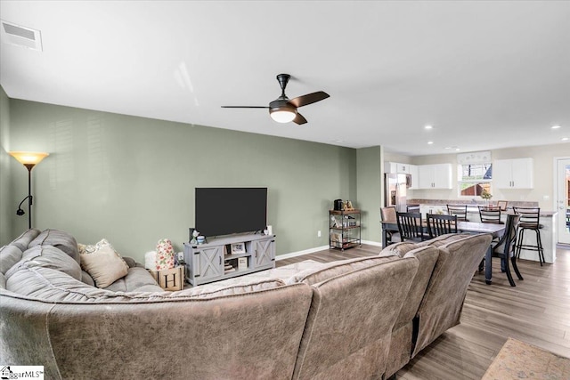 275 Ralston Rd, Greer, SC 29651 - living room featuring light wood finished floors, recessed lighting, a ceiling fan, and baseboards