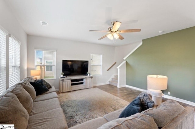 1019 Appalachian Dr, Moore, SC 29369 - living room with ceiling fan, stairs, wood finished floors, and baseboards