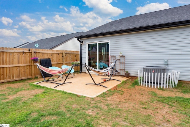 101 Sunrise Rd, Spartanburg, SC 29302 - rear view of house with central air condition unit, a patio, and a shingled roof