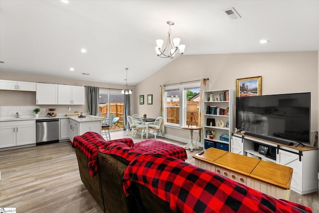 101 Sunrise Rd, Spartanburg, SC 29302 - living room featuring a chandelier, light wood-style floors, vaulted ceiling, and recessed lighting