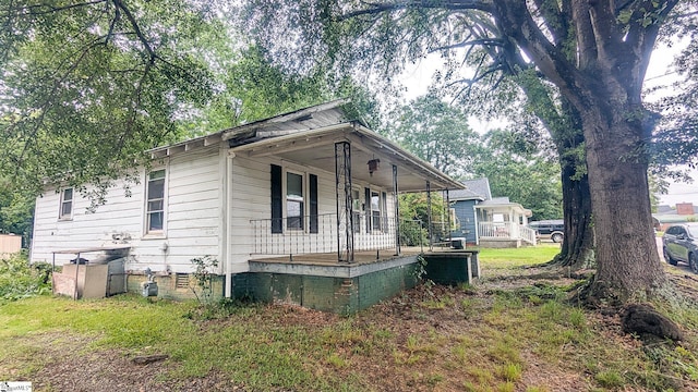 104 Albert St, Greer, SC 29651 - view of property exterior with a porch and crawl space