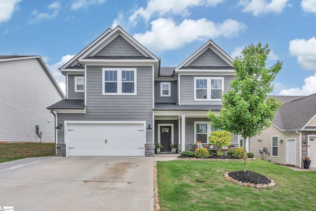 113 Marshfield Trl, Simpsonville, SC 29680 - craftsman-style house with concrete driveway, a porch, an attached garage, a front lawn, and stone siding