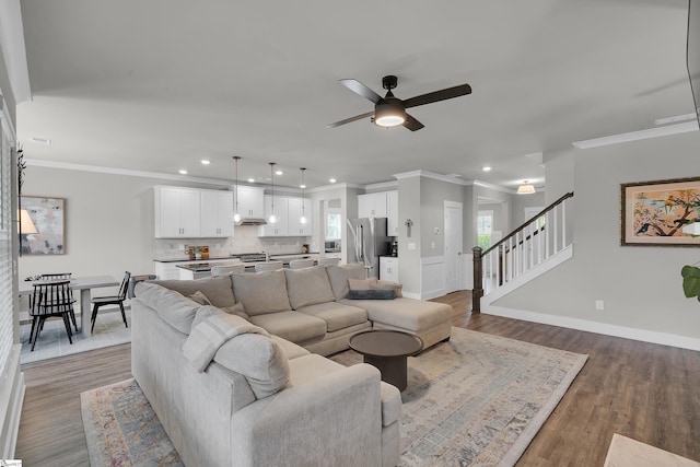 113 Marshfield Trl, Simpsonville, SC 29680 - living room featuring crown molding, recessed lighting, a ceiling fan, baseboards, and stairway
