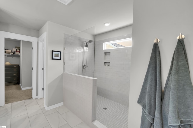 113 Marshfield Trl, Simpsonville, SC 29680 - bathroom featuring a walk in shower, baseboards, and a walk in closet