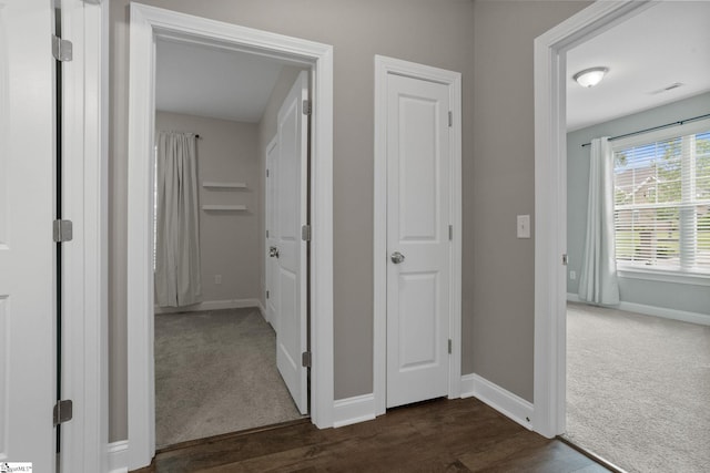 116 Woodstone Dr, Easley, SC 29642 - hallway with dark carpet, baseboards, and dark wood finished floors