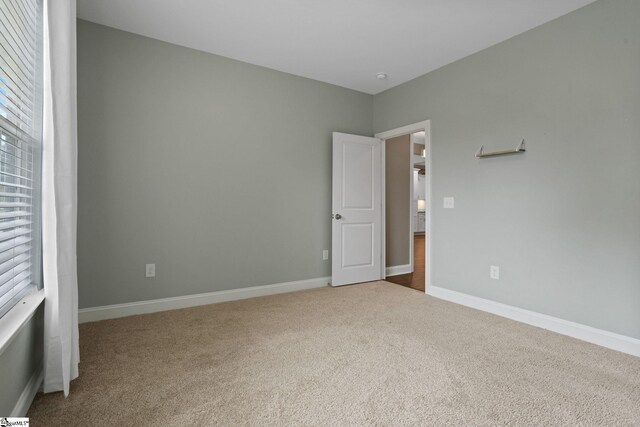 116 Woodstone Dr, Easley, SC 29642 - unfurnished bedroom featuring carpet floors and baseboards