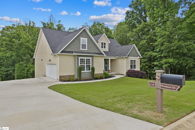 116 Woodstone Dr, Easley, SC 29642 - view of front of house with driveway, a shingled roof, a garage, and a front lawn