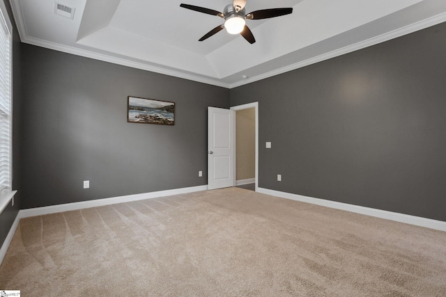 116 Woodstone Dr, Easley, SC 29642 - carpeted spare room featuring a raised ceiling, ceiling fan, baseboards, and crown molding