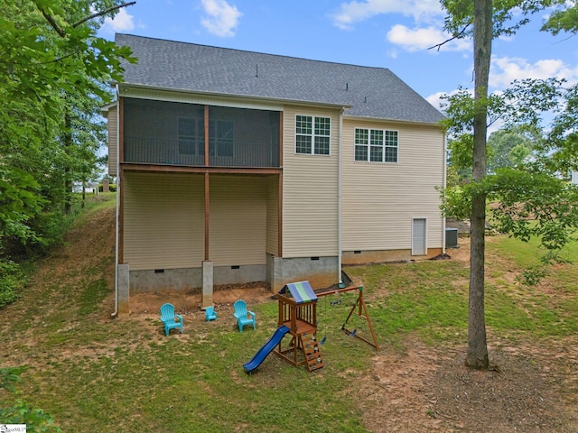 116 Woodstone Dr, Easley, SC 29642 - back of property featuring crawl space, a lawn, central air condition unit, and a sunroom