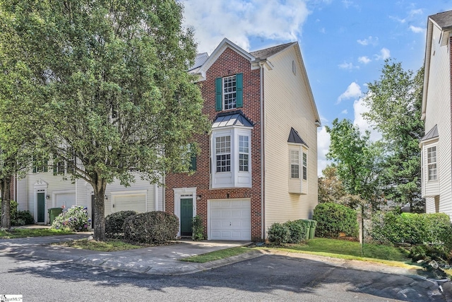 470 Canewood Pl, Mauldin, SC 29662 - view of front facade featuring a garage, brick siding, and asphalt driveway