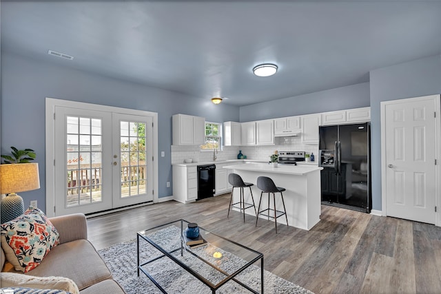 470 Canewood Pl, Mauldin, SC 29662 - living room with french doors and light wood-style floors