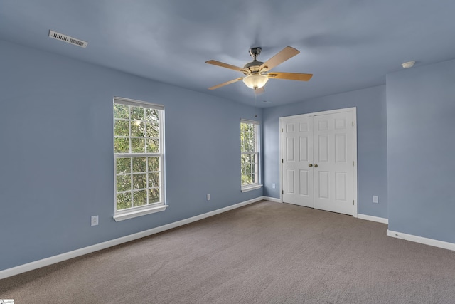 470 Canewood Pl, Mauldin, SC 29662 - unfurnished bedroom featuring baseboards, carpet flooring, a closet, and ceiling fan
