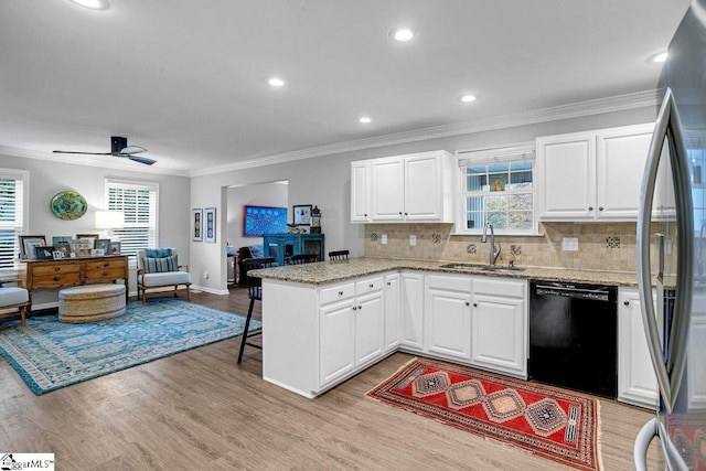 500 E Mountain Creek Rd, Taylors, SC 29687 - kitchen with dishwasher, crown molding, stainless steel fridge, a peninsula, and plenty of natural light