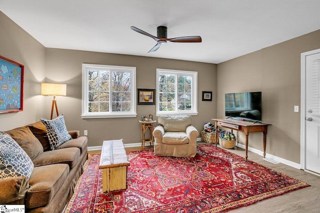 500 E Mountain Creek Rd, Taylors, SC 29687 - living area with a ceiling fan, wood finished floors, and baseboards
