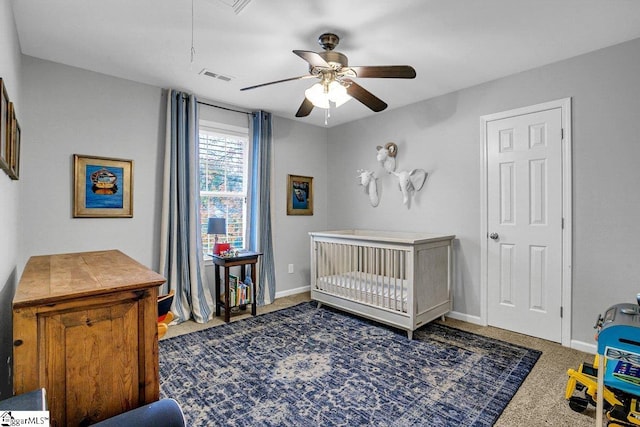500 E Mountain Creek Rd, Taylors, SC 29687 - carpeted bedroom featuring attic access, a crib, a ceiling fan, and baseboards