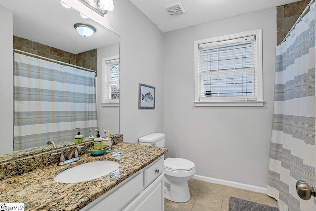 500 E Mountain Creek Rd, Taylors, SC 29687 - bathroom with vanity, toilet, tile patterned floors, baseboards, and a shower with shower curtain