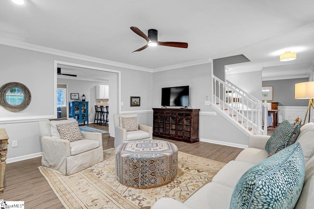 500 E Mountain Creek Rd, Taylors, SC 29687 - living area with a ceiling fan, wood finished floors, ornamental molding, and stairway