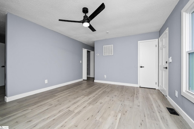 127 Chelsea St, Moore, SC 29369 - unfurnished room featuring ceiling fan, light wood finished floors, a textured ceiling, and baseboards