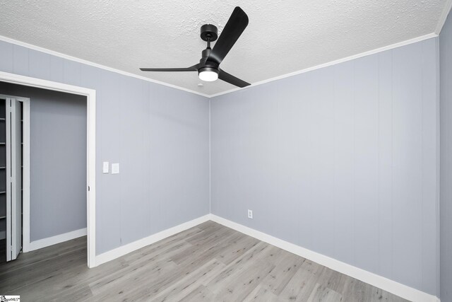 127 Chelsea St, Moore, SC 29369 - unfurnished bedroom with crown molding, a textured ceiling, wood finished floors, ceiling fan, and baseboards