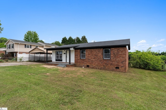127 Chelsea St, Moore, SC 29369 - view of front of home with crawl space, brick siding, a carport, and driveway