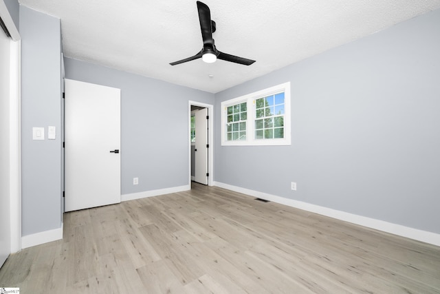 127 Chelsea St, Moore, SC 29369 - unfurnished bedroom with light wood finished floors, baseboards, and a ceiling fan