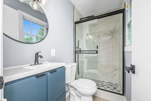 127 Chelsea St, Moore, SC 29369 - bathroom featuring toilet, vanity, and a shower stall