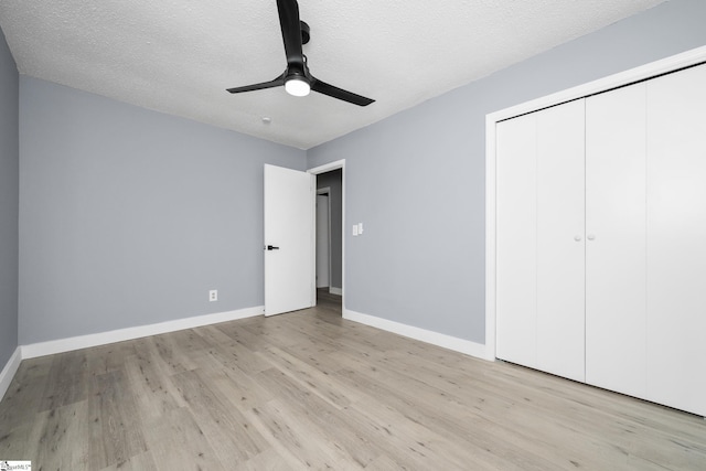 127 Chelsea St, Moore, SC 29369 - unfurnished bedroom featuring wood finished floors, baseboards, a closet, a textured ceiling, and ceiling fan