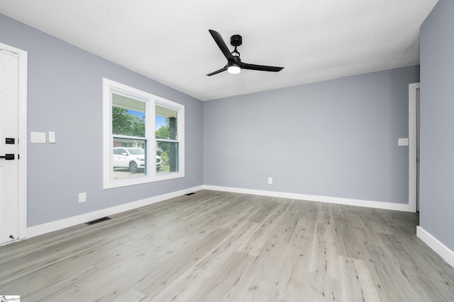 127 Chelsea St, Moore, SC 29369 - empty room featuring light wood-type flooring, a ceiling fan, and baseboards
