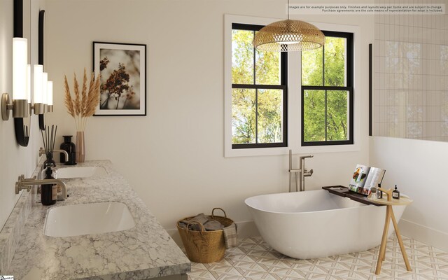 217 Trevi Dr Lot 463, Greenville, SC 29609 - bathroom with a soaking tub, double vanity, and baseboards