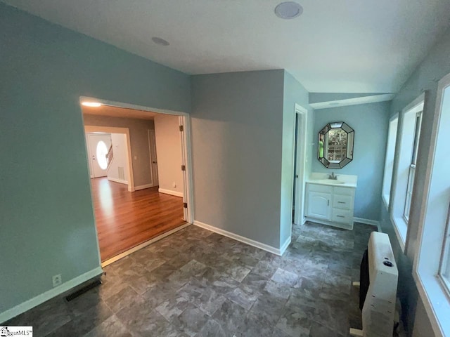 1002 Still Holllow Ln, Taylors, SC 29687 - spare room featuring baseboards and heating unit