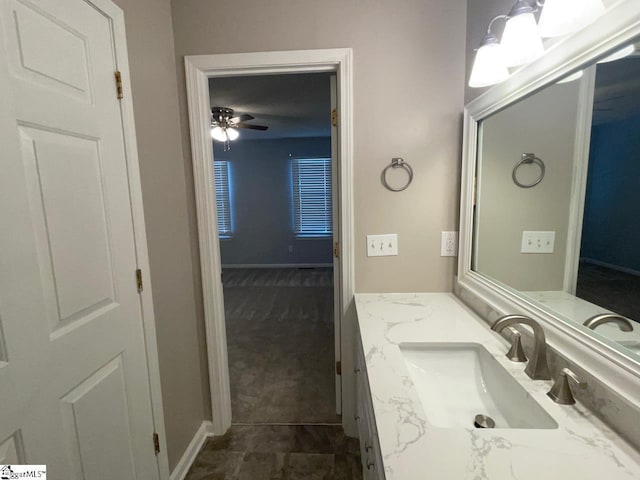 1002 Still Holllow Ln, Taylors, SC 29687 - bathroom with vanity, ceiling fan, and baseboards