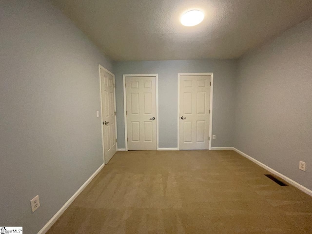1002 Still Holllow Ln, Taylors, SC 29687 - unfurnished bedroom featuring baseboards and carpet floors