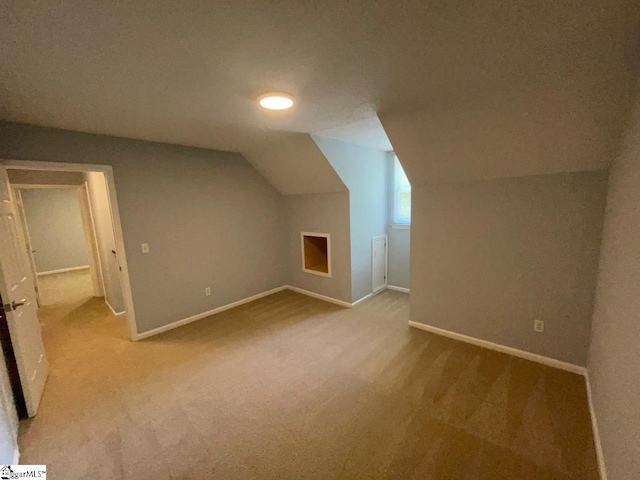 1002 Still Holllow Ln, Taylors, SC 29687 - additional living space with carpet floors, lofted ceiling, and baseboards