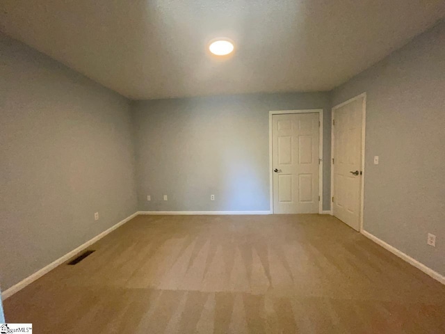 1002 Still Holllow Ln, Taylors, SC 29687 - carpeted empty room with baseboards