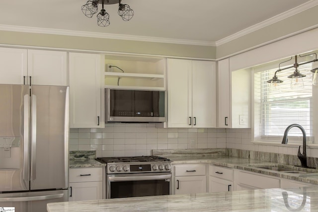 418 N Alabama Ave, Chesnee, SC 29323 - kitchen featuring stainless steel appliances, a sink, open shelves, white cabinets, and crown molding