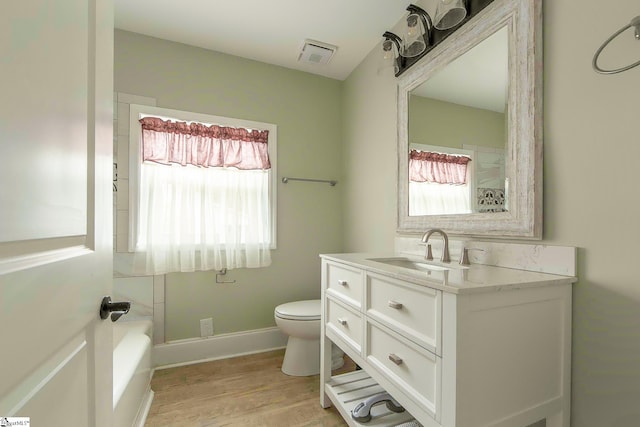 418 N Alabama Ave, Chesnee, SC 29323 - full bath with vanity, toilet, a shower with shower curtain, baseboards, and wood finished floors