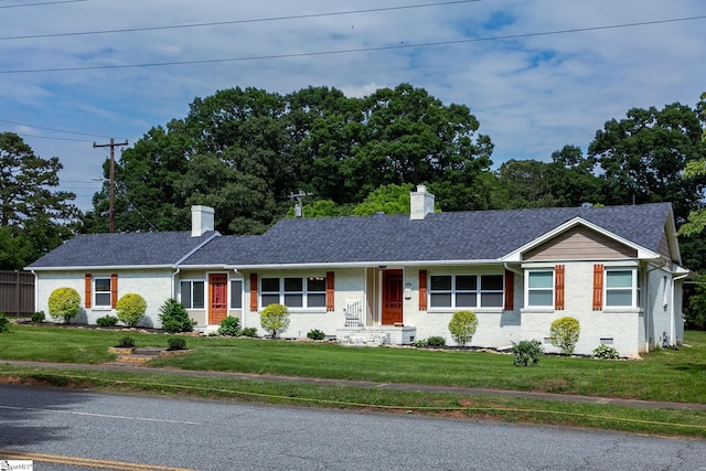 418 N Alabama Ave, Chesnee, SC 29323 - ranch-style house featuring a chimney, brick siding, and a front yard