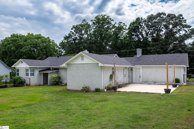 418 N Alabama Ave, Chesnee, SC 29323 - ranch-style house with a patio area, a chimney, brick siding, and roof with shingles