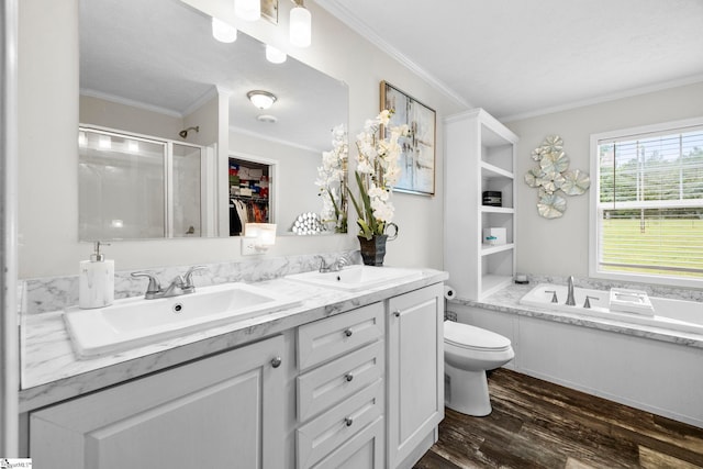 105 Penson Rd, Honea Path, SC 29654 - full bathroom with a shower stall, wood finished floors, double vanity, a garden tub, and toilet