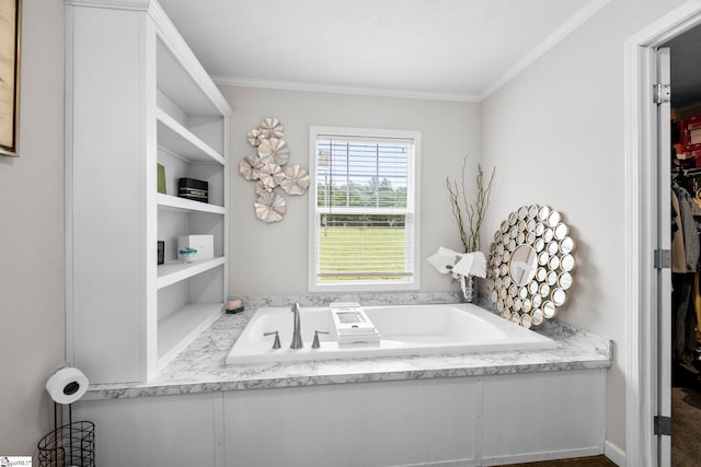 105 Penson Rd, Honea Path, SC 29654 - bathroom featuring a bath, crown molding, and a walk in closet