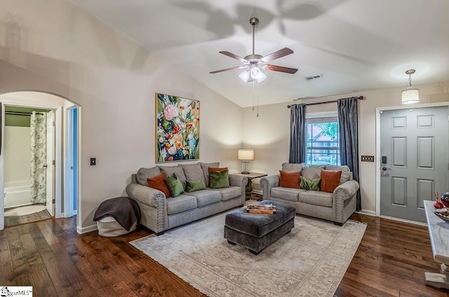 653 Chartwell Dr, Greer, SC 29650 - living room featuring a ceiling fan, vaulted ceiling, dark wood finished floors, arched walkways, and baseboards