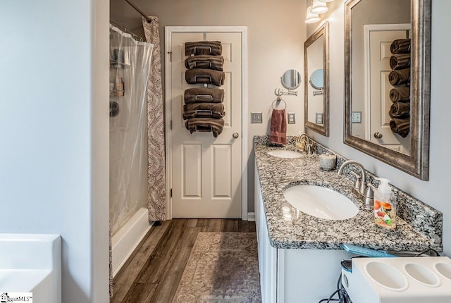 653 Chartwell Dr, Greer, SC 29650 - bathroom featuring wood finished floors and double vanity