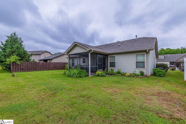 653 Chartwell Dr, Greer, SC 29650 - back of house with a sunroom and roof with shingles