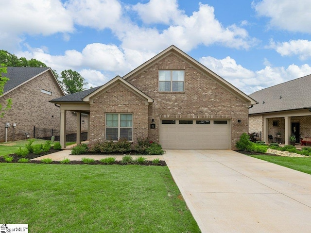 115 Harbor Master Ln, Taylors, SC 29687 - view of front of home featuring brick siding, driveway, and an attached garage