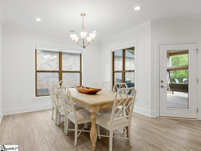115 Harbor Master Ln, Taylors, SC 29687 - dining space with a chandelier, light wood-type flooring, baseboards, crown molding, and recessed lighting