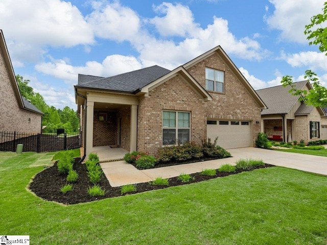 115 Harbor Master Ln, Taylors, SC 29687 - view of front facade with brick siding, concrete driveway, a garage, and roof with shingles