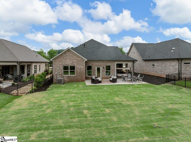 115 Harbor Master Ln, Taylors, SC 29687 - back of house with brick siding, a patio area, an outdoor living space, cooling unit, and a shingled roof