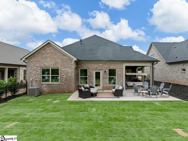 115 Harbor Master Ln, Taylors, SC 29687 - rear view of house featuring an outdoor hangout area, brick siding, a patio area, and roof with shingles